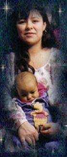 Brandy Knappenberger holding her holding her baby daughter Skylar.